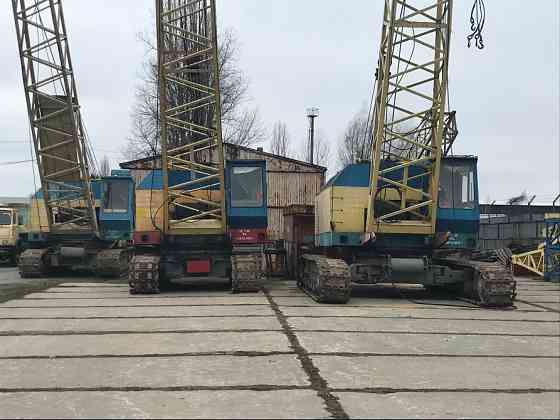 Кран гусеничний МКГ-25БР - Продажа. Бровары